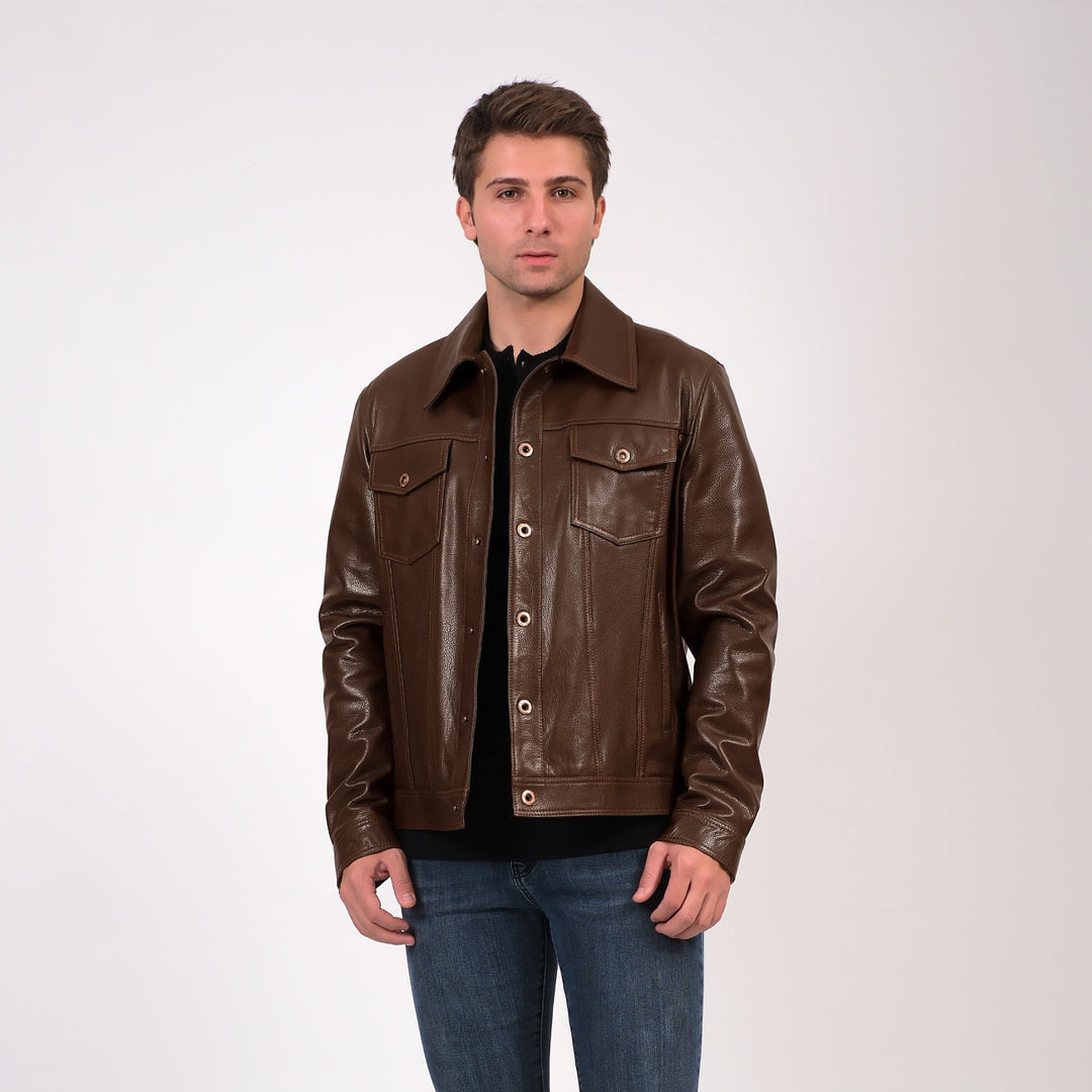 Image of a man wearing a brown leather jacket showcasing men's leather jackets by Furniq