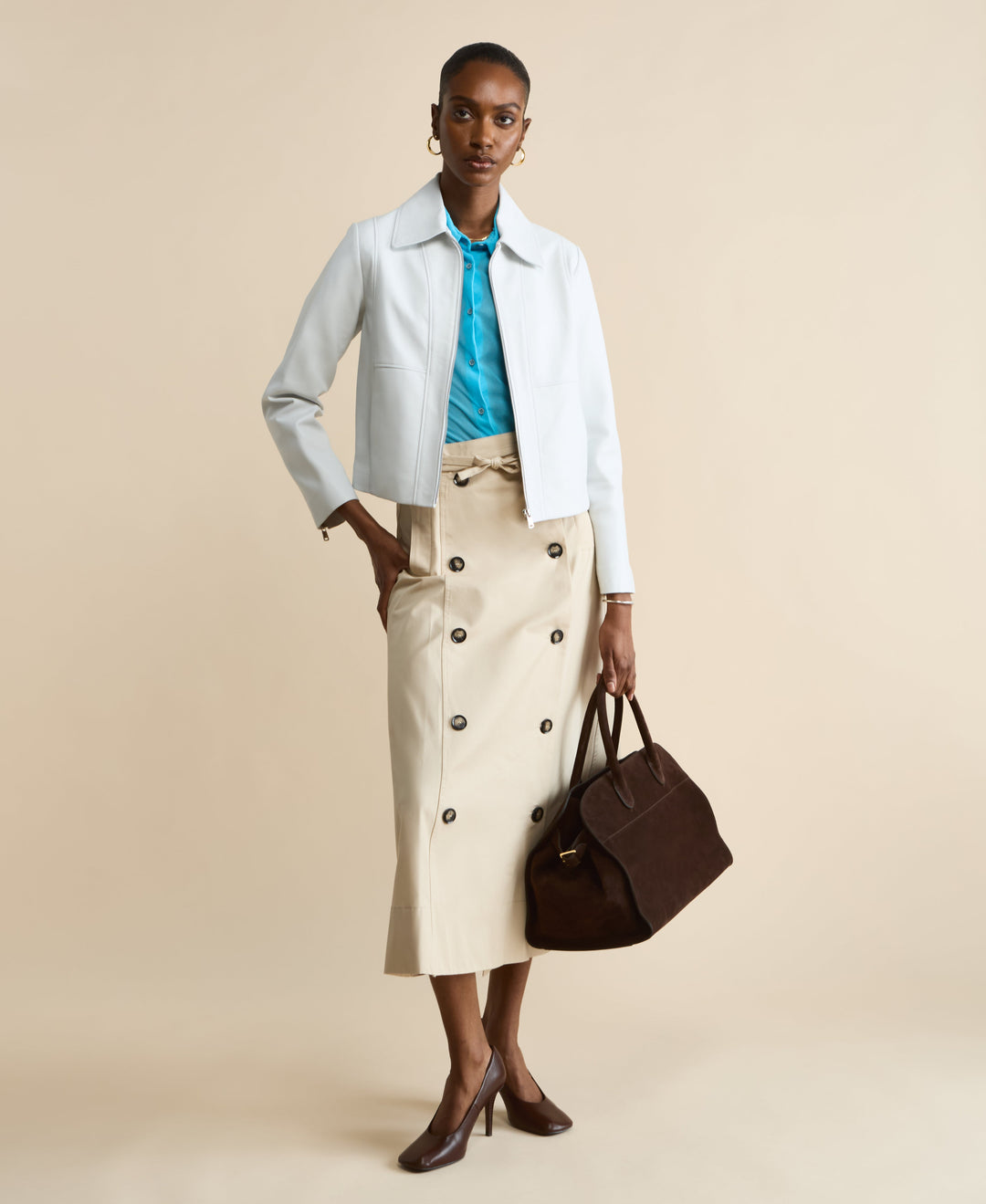 Light blue leather jacket on model