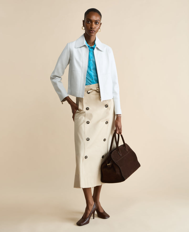 Light blue leather jacket on model