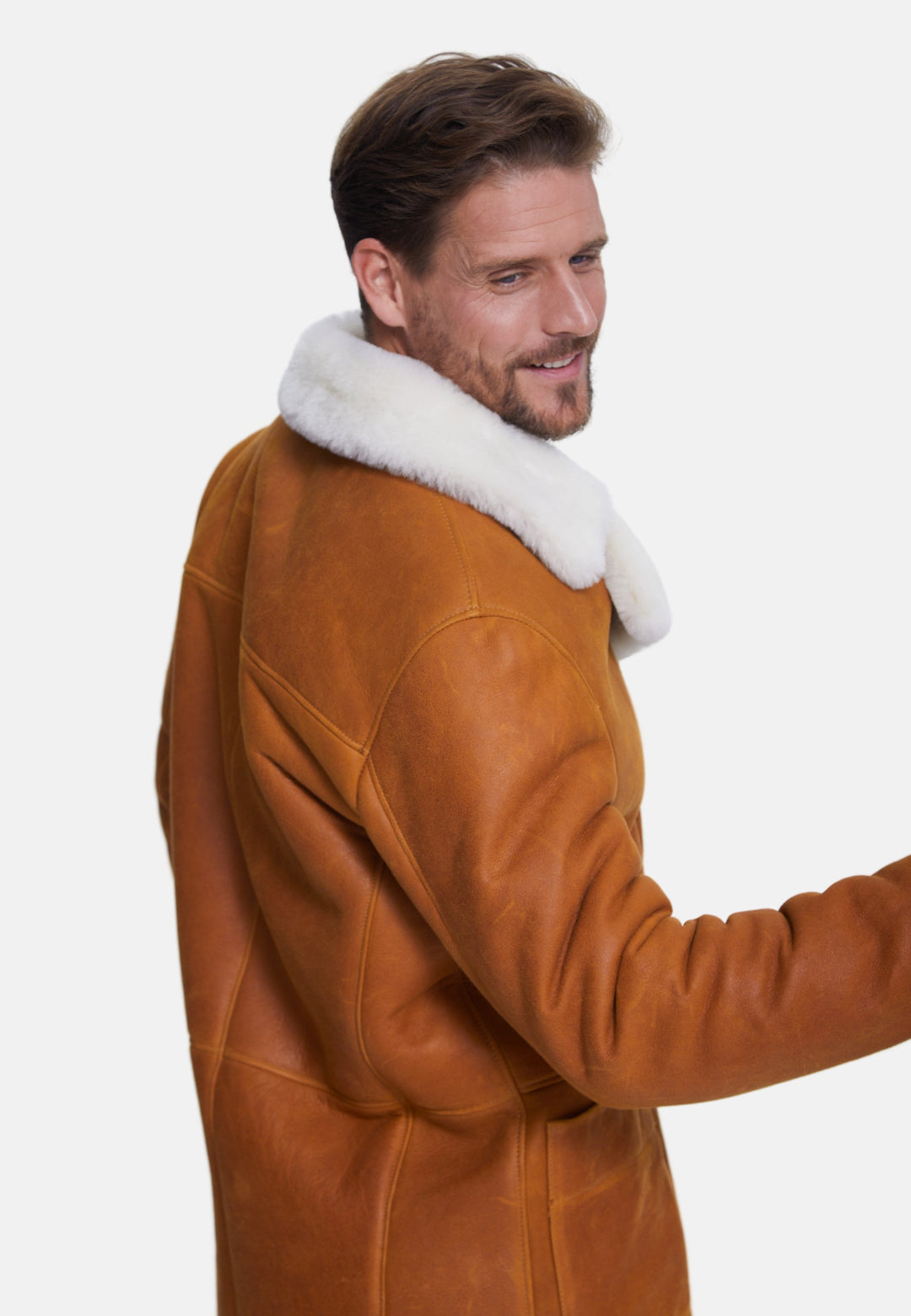 Man wearing brown sheepskin coat