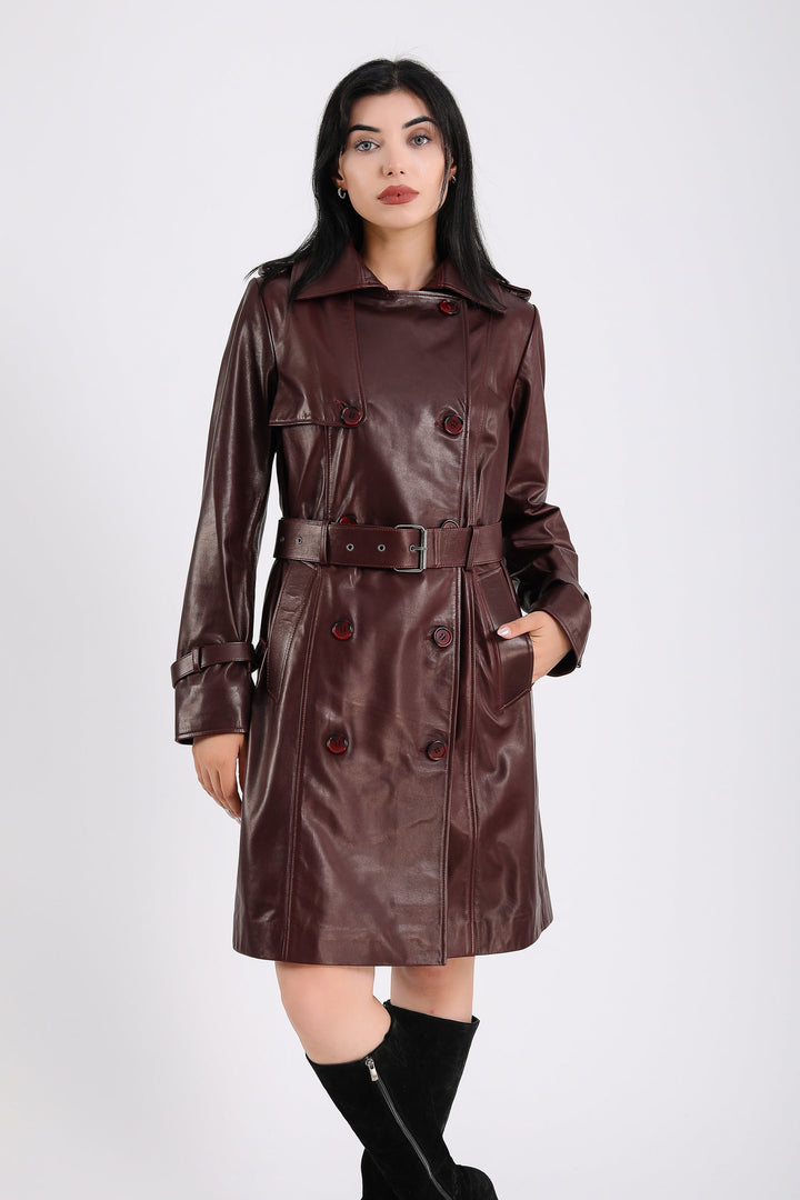 Woman wearing burgundy leather trench coat