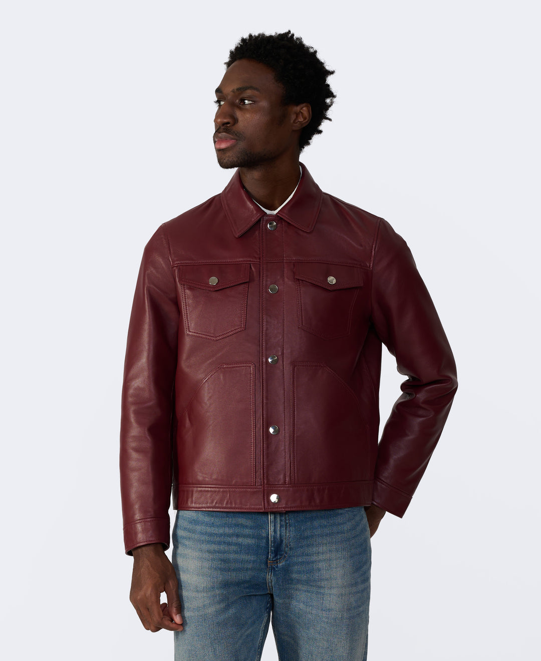 Burgundy leather trucker jacket on model