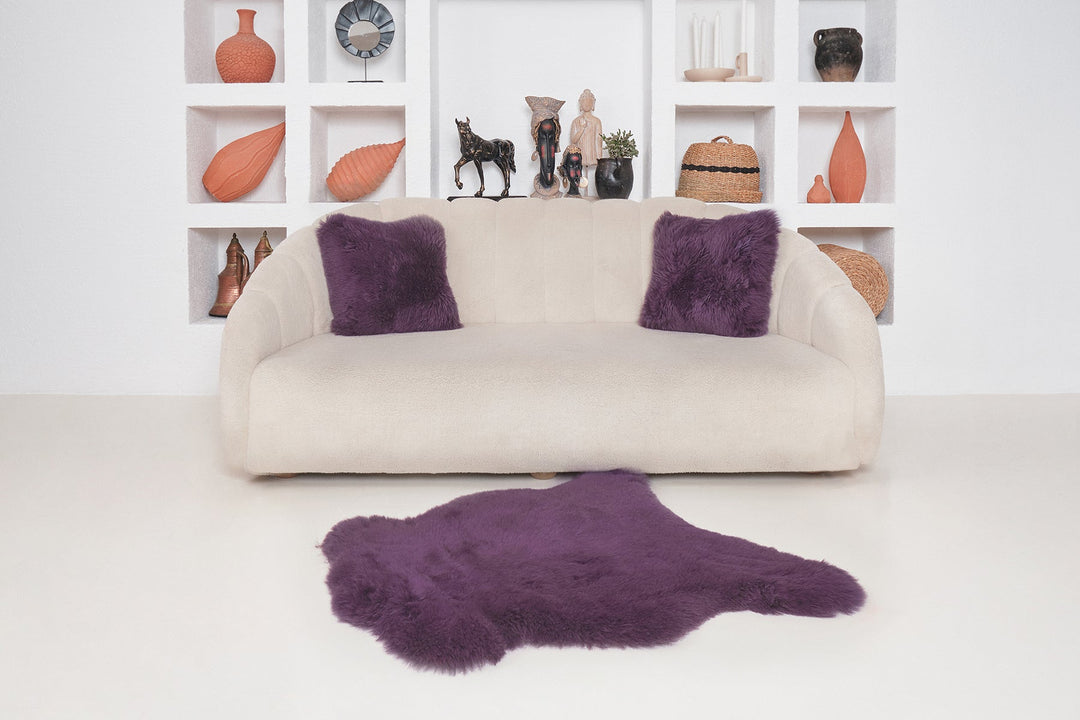 Purple sheepskin rug in living room