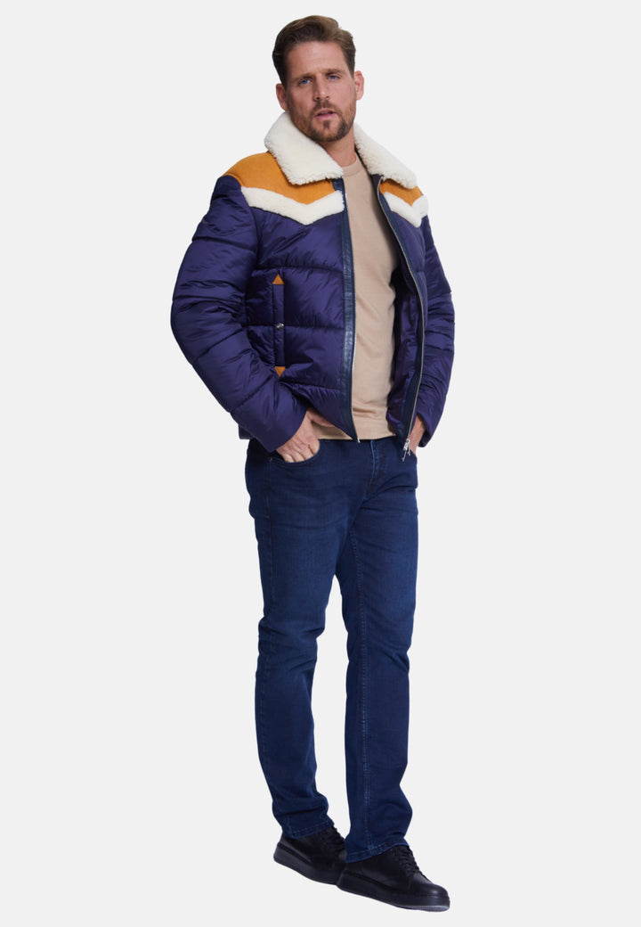 Man wearing navy puffer coat with shearling