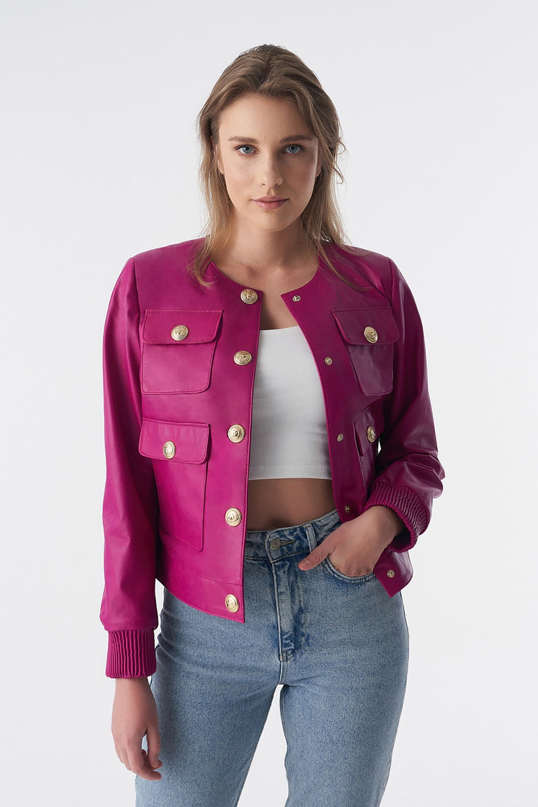 Woman wearing pink cropped leather jacket