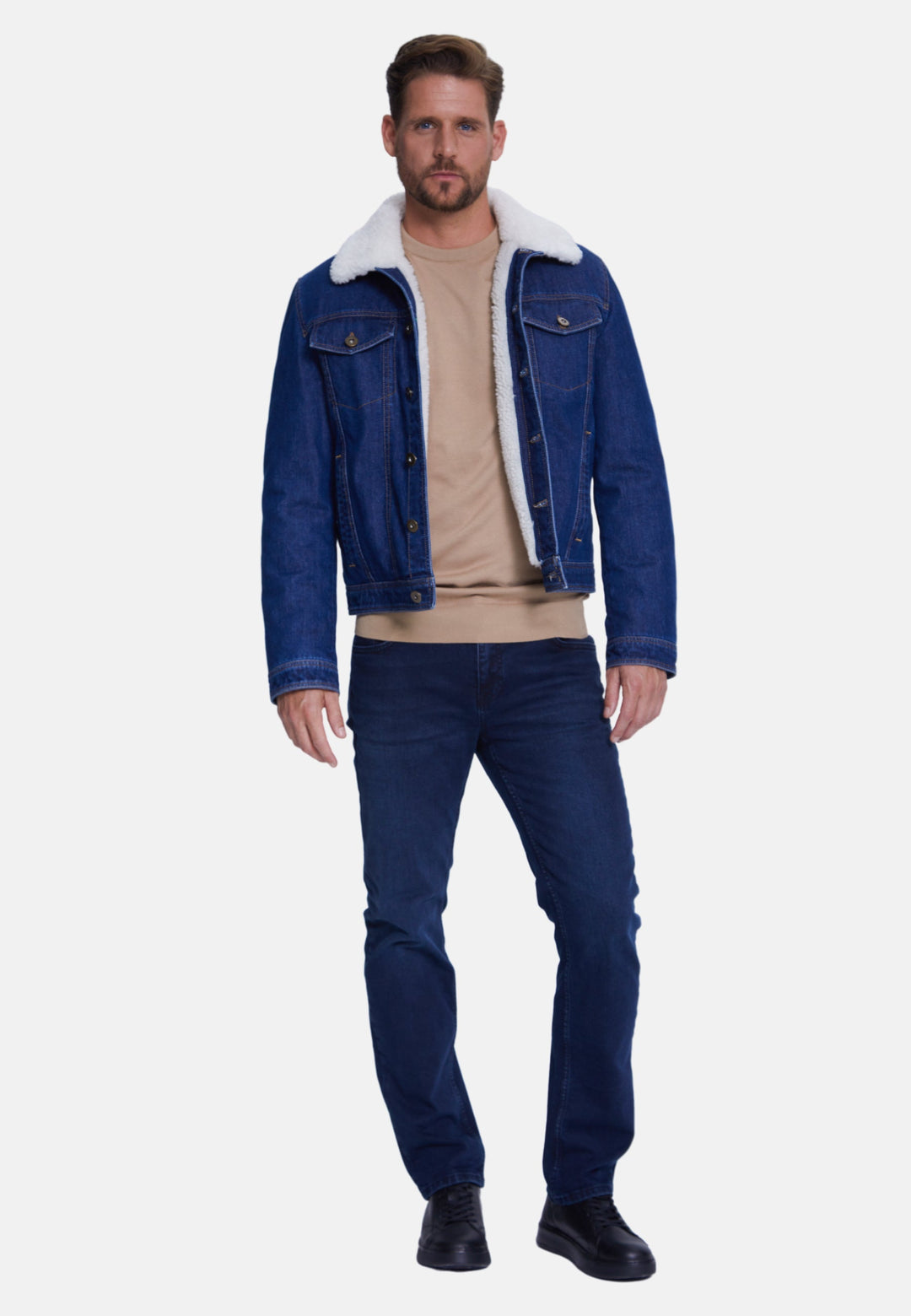 Male model wearing blue jean jacket with sherpa collar