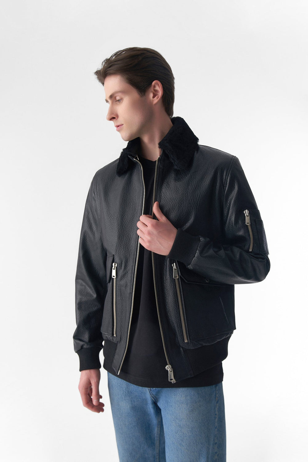 Man wearing black shearling leather jacket