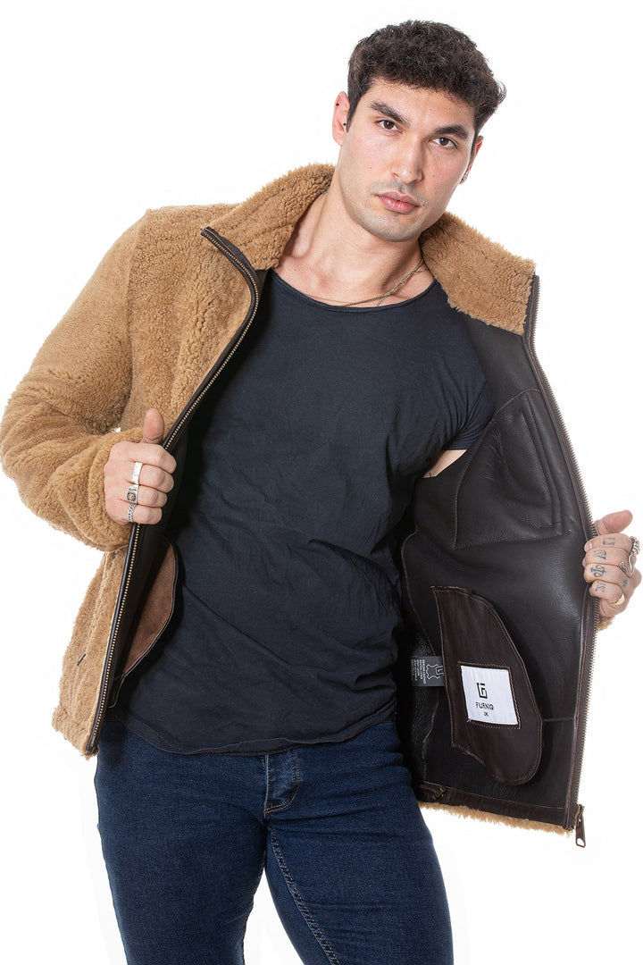 Male model wearing tan teddy coat