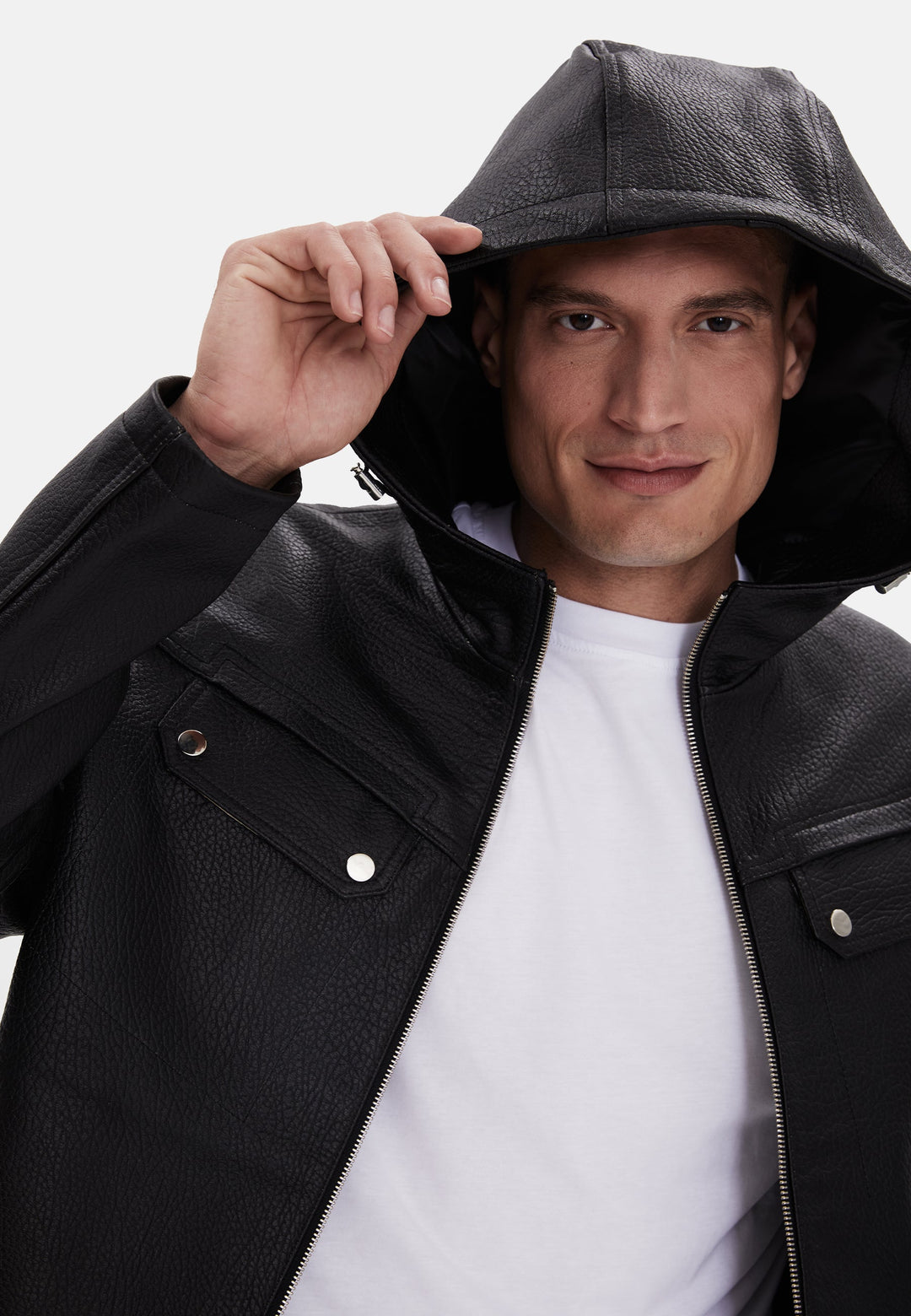 Man wearing black leather hooded jacket