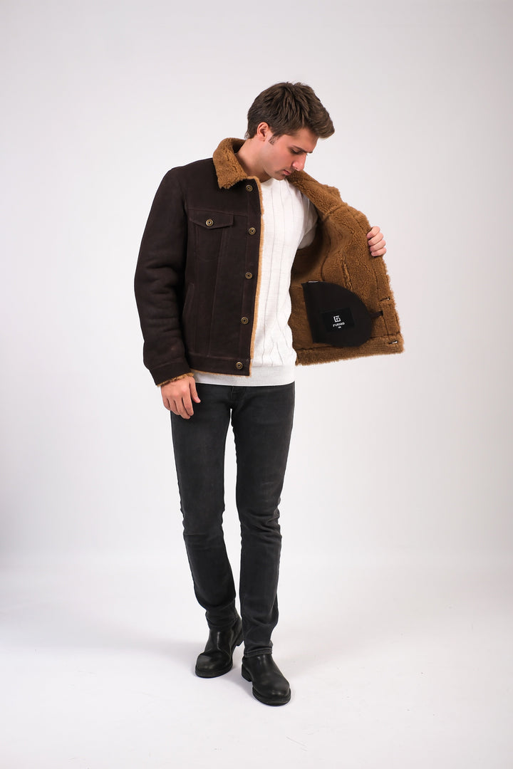 Man wearing brown shearling jacket