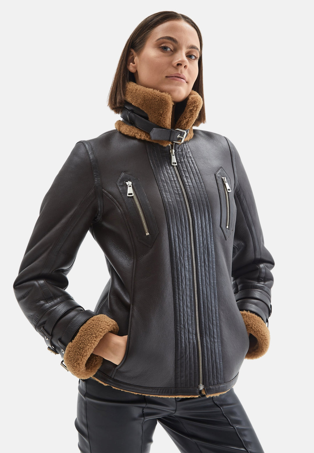 Woman in brown sheepskin jacket