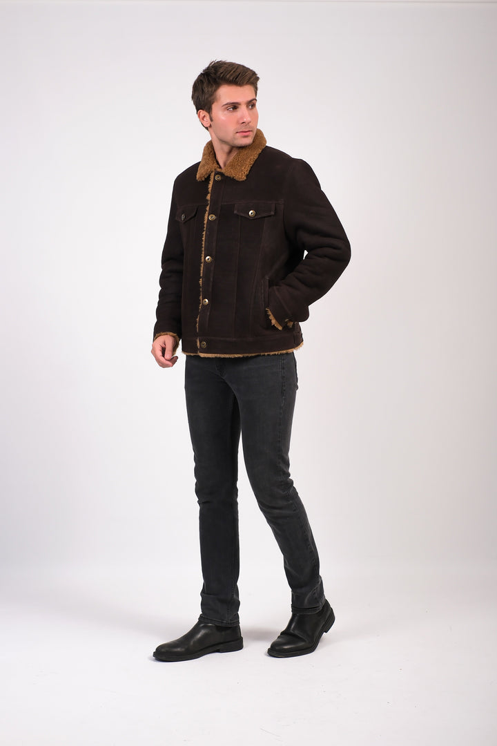 Man wearing brown shearling jacket