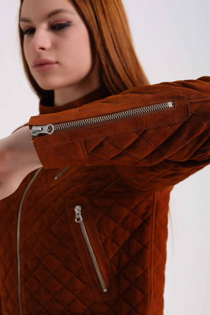 Rust quilted suede jacket close-up