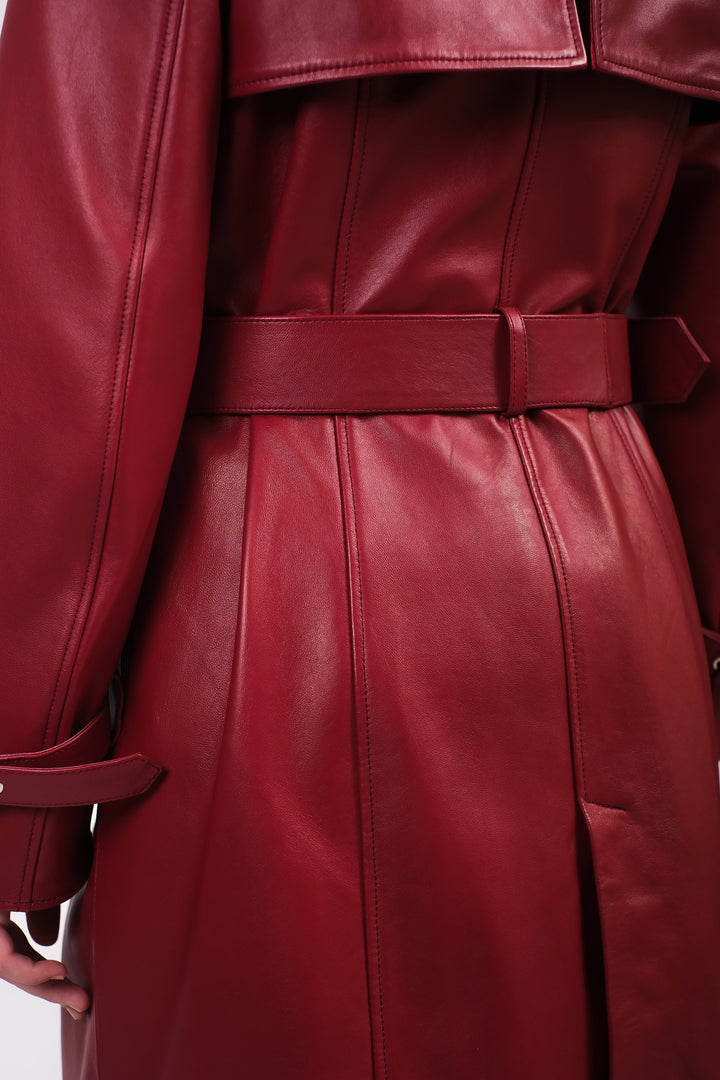 Red leather trench coat back close-up