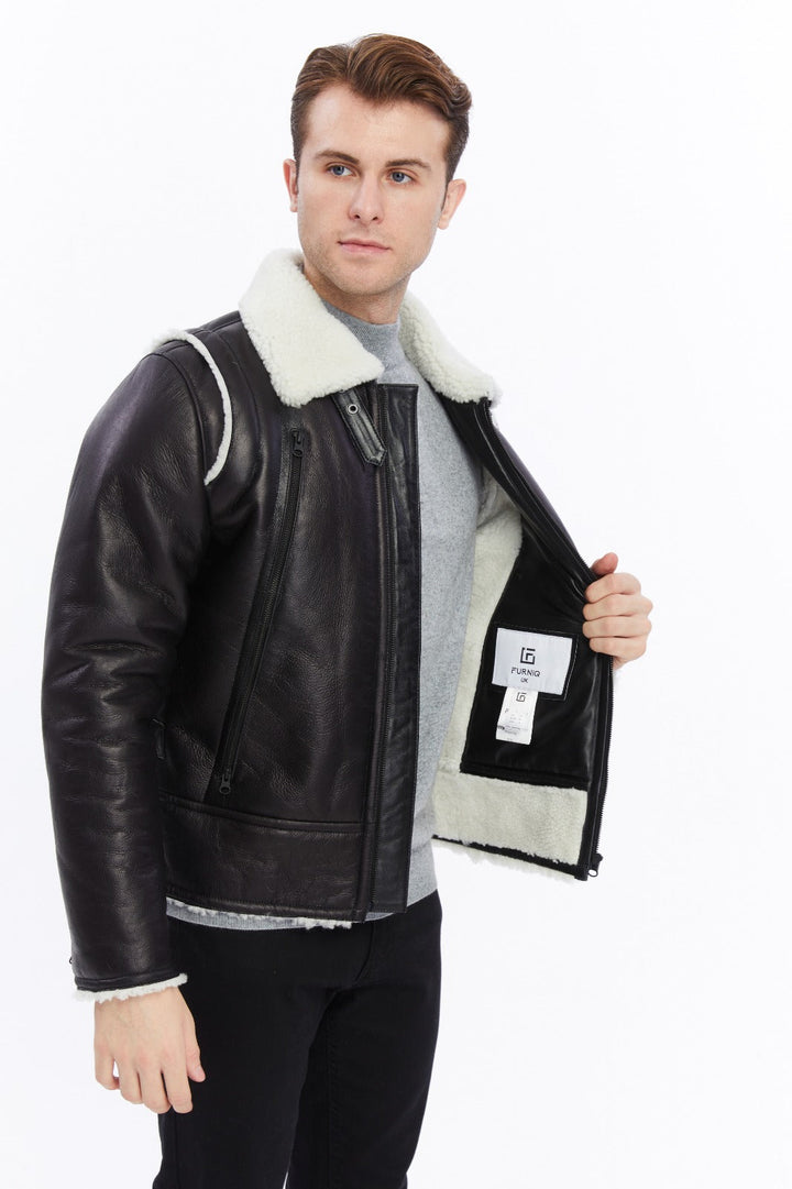 Man wearing black shearling jacket