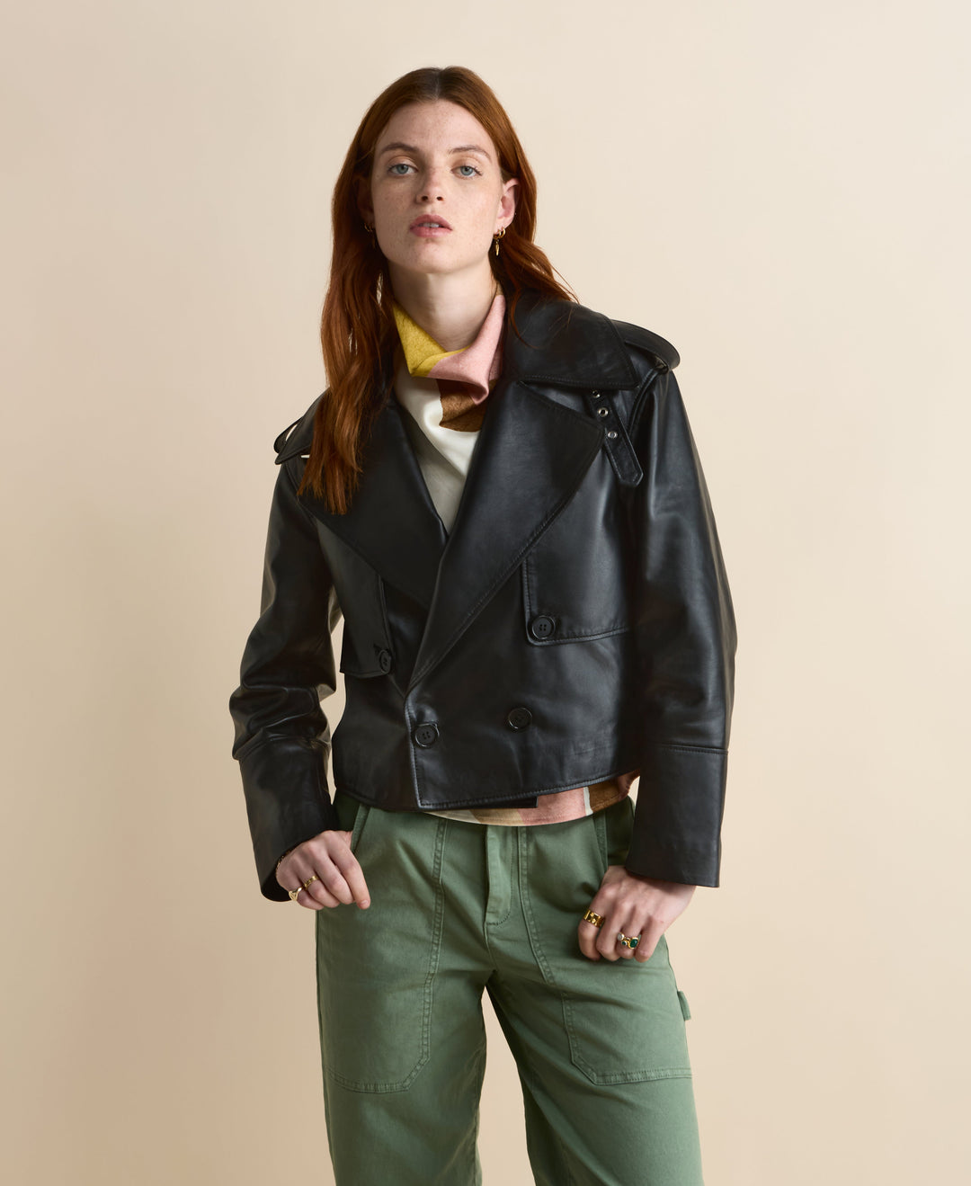 Woman wearing black leather biker jacket