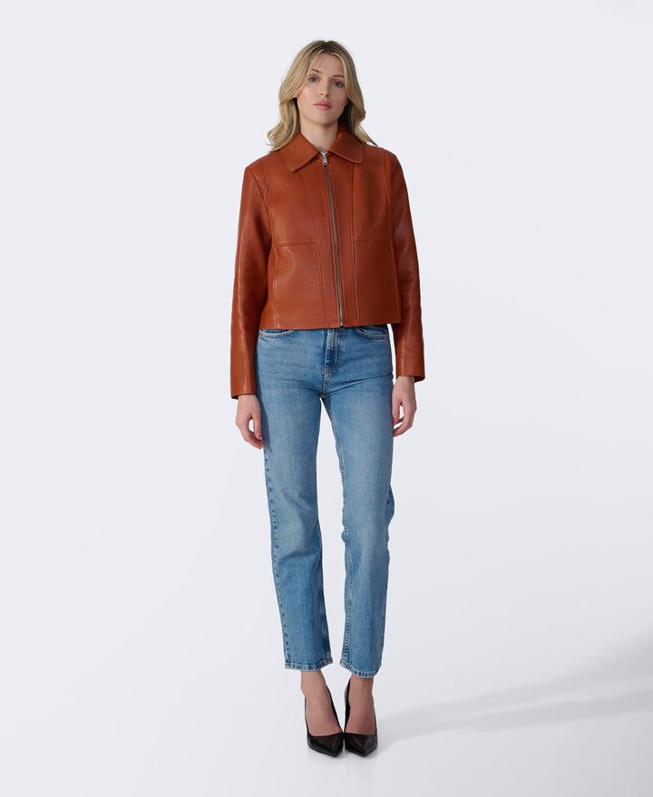 Brown leather zip jacket on model