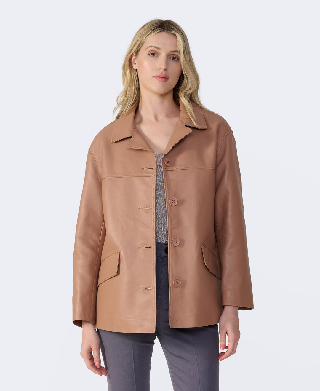 Woman wearing tan leather jacket