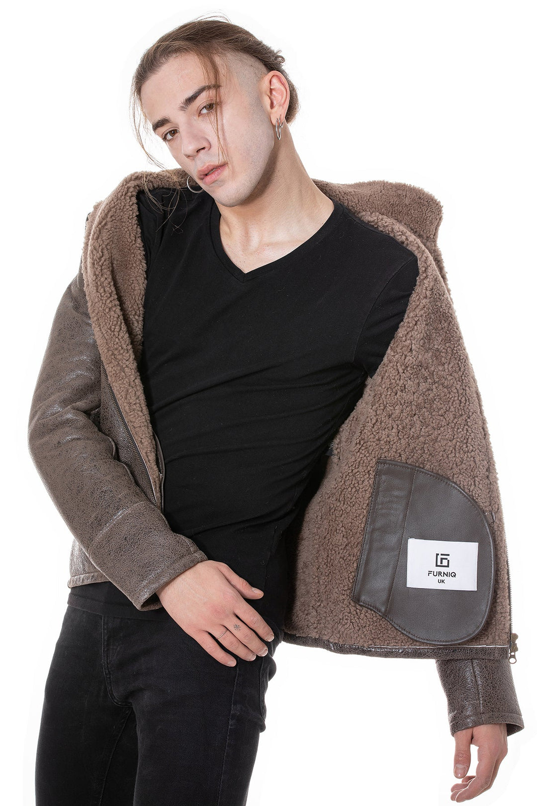 Male model wearing brown sheepskin jacket