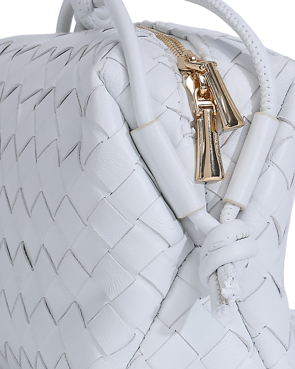 White woven leather crossbody bag detail