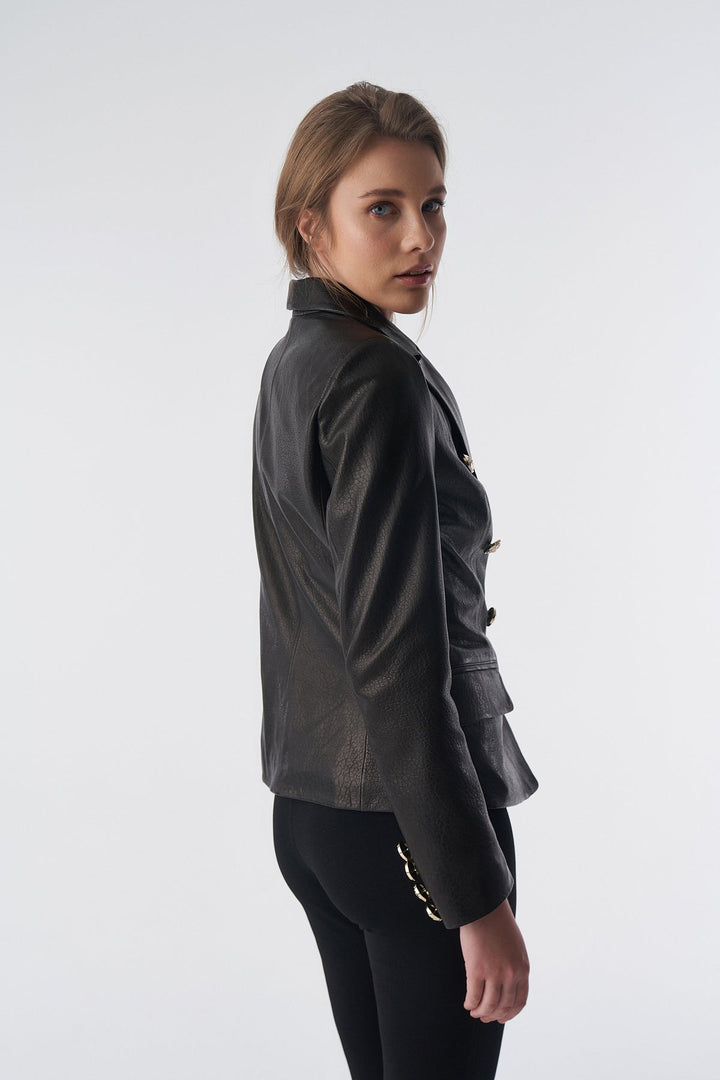 Woman wearing black leather blazer