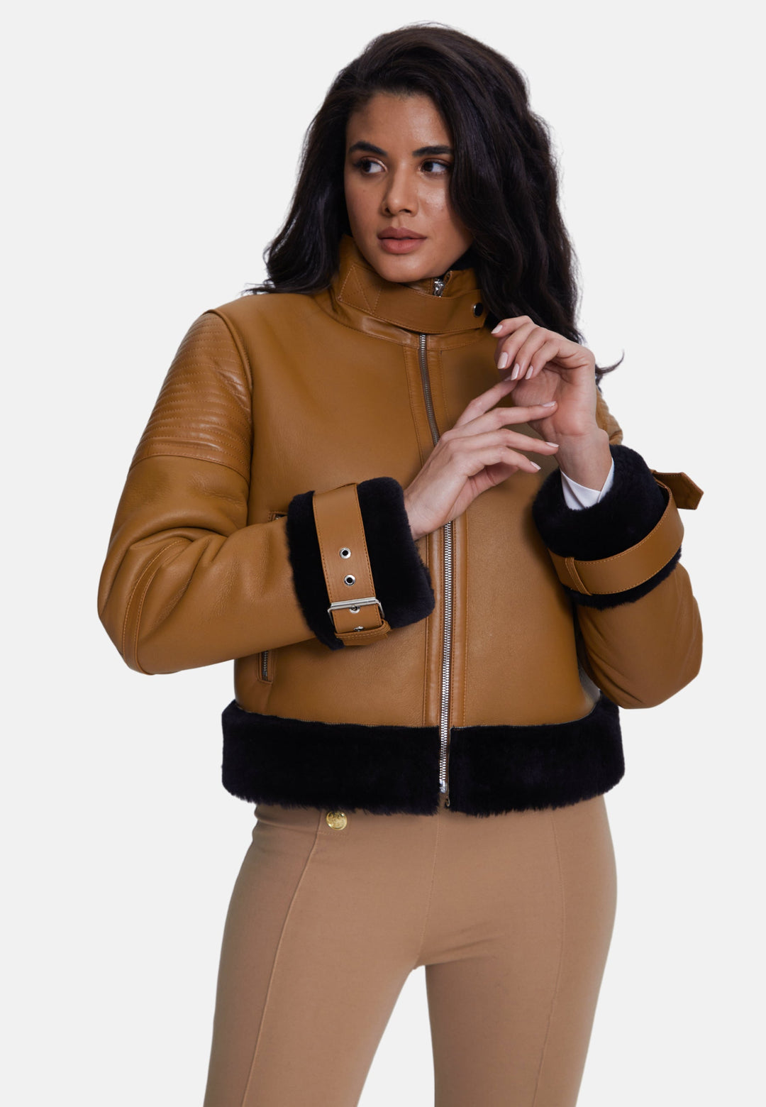 Cropped brown sheepskin jacket with black trim