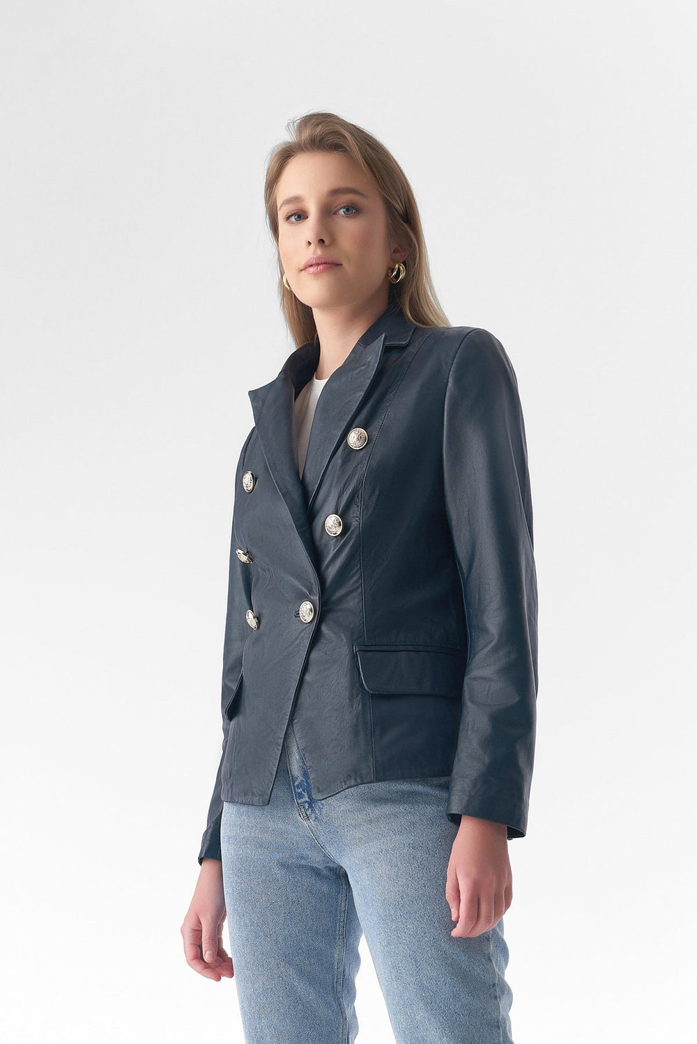 Woman wearing blue leather blazer