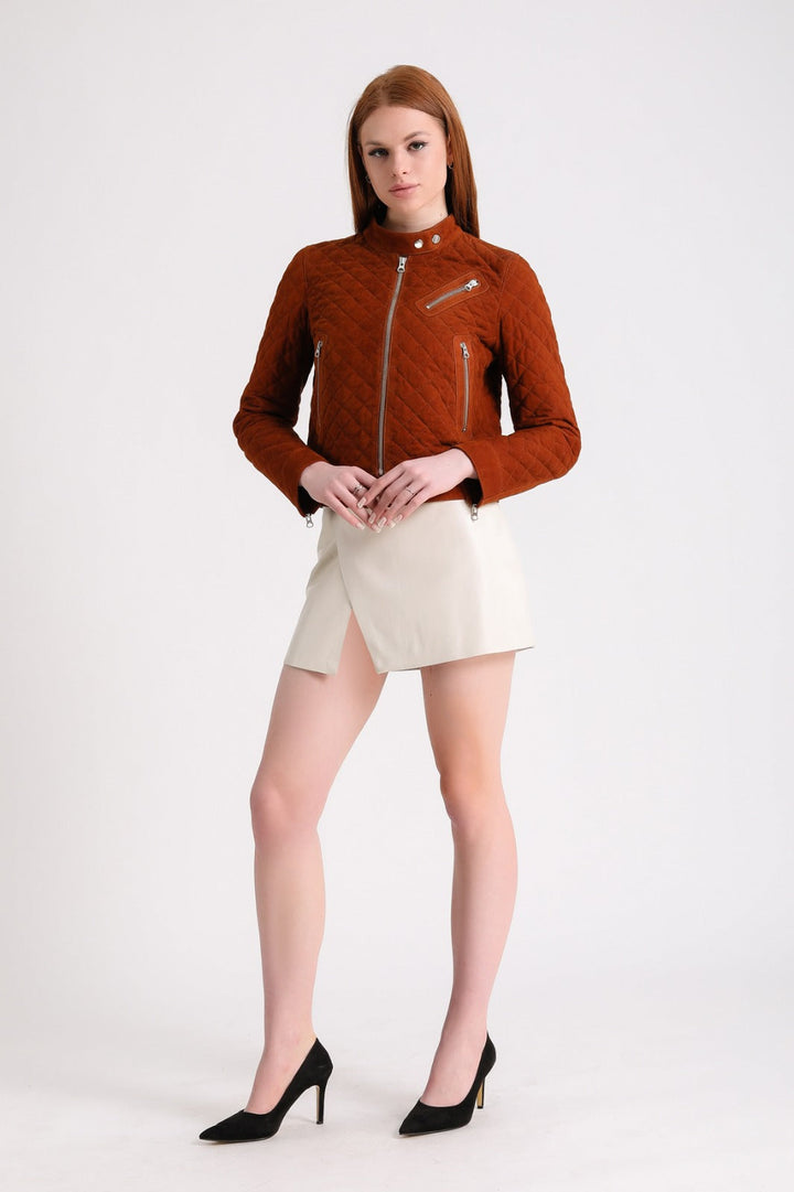 Woman wearing rust suede jacket