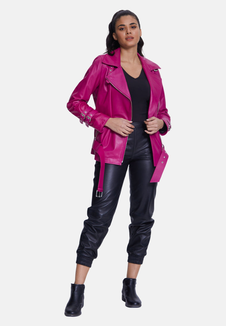 Woman wearing fuchsia leather biker jacket