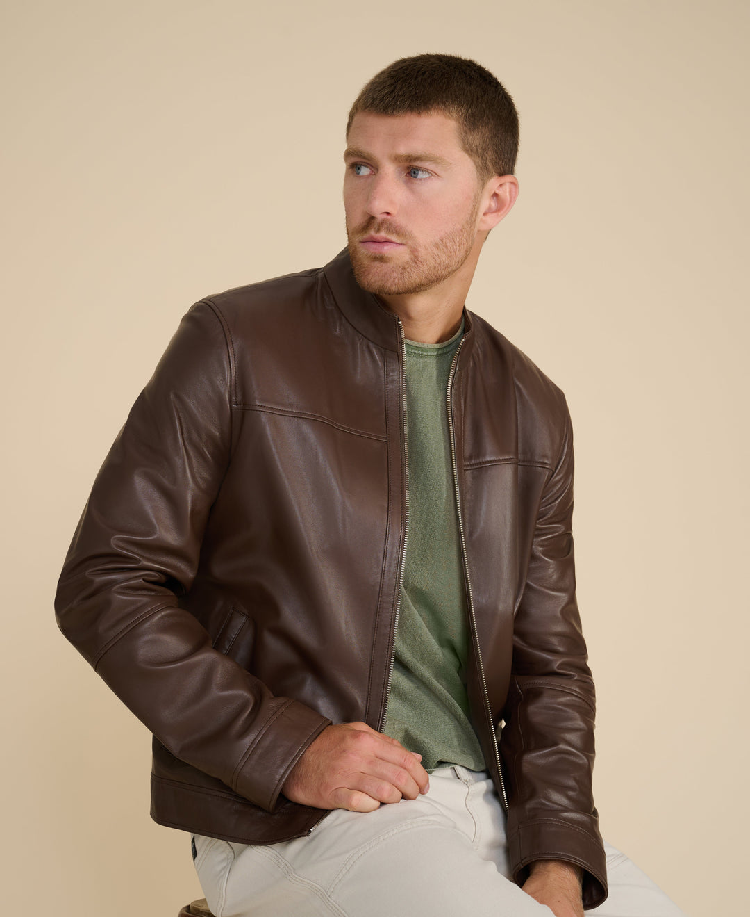 Man wearing brown leather jacket