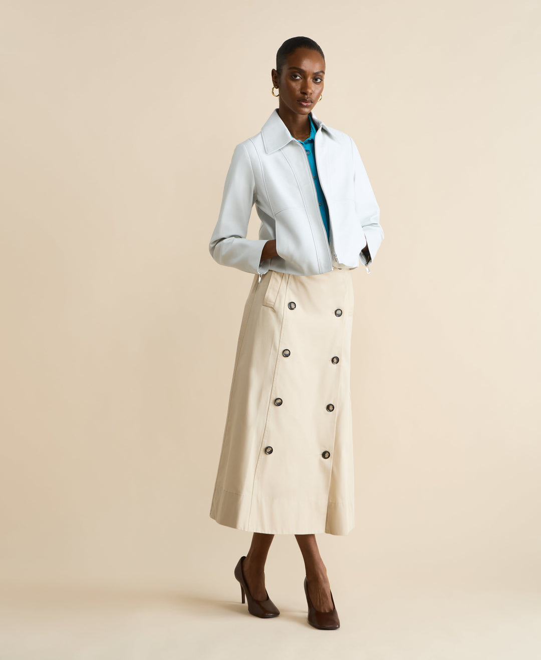 Light blue leather jacket on model