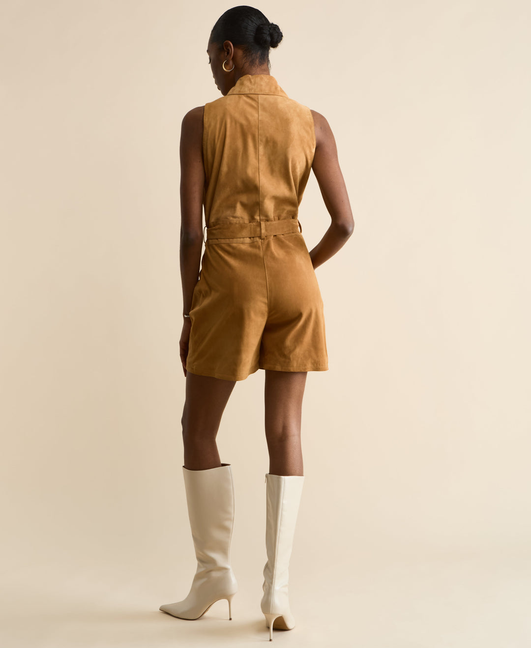 Back view of tan suede romper