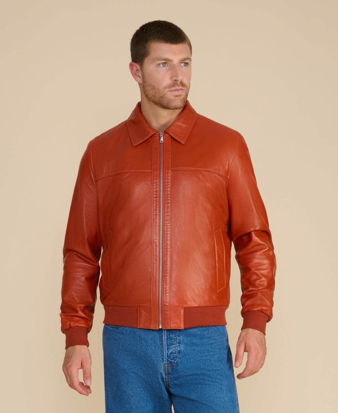 Cognac leather bomber jacket on model