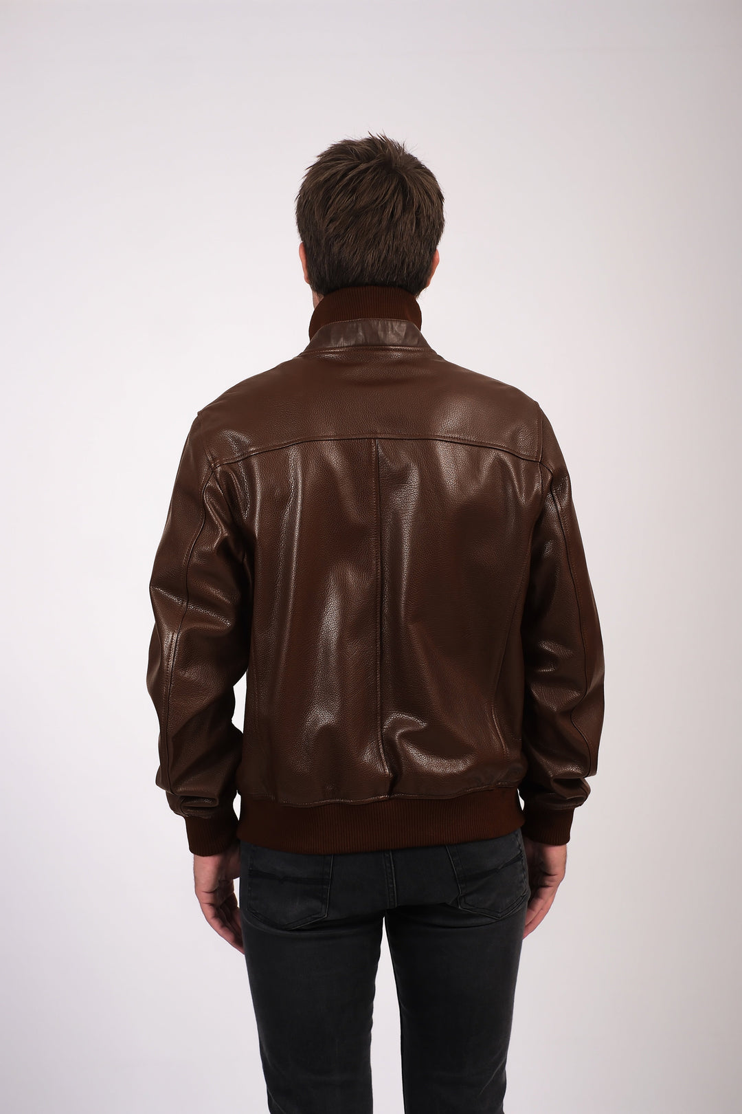 Back view brown leather jacket on model