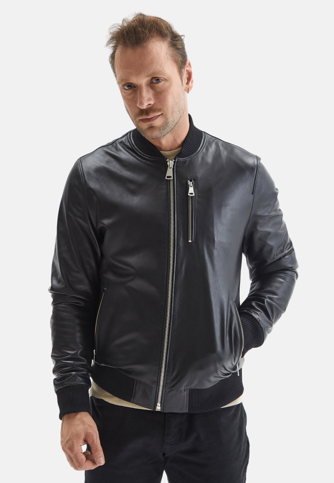 Man wearing black leather bomber jacket
