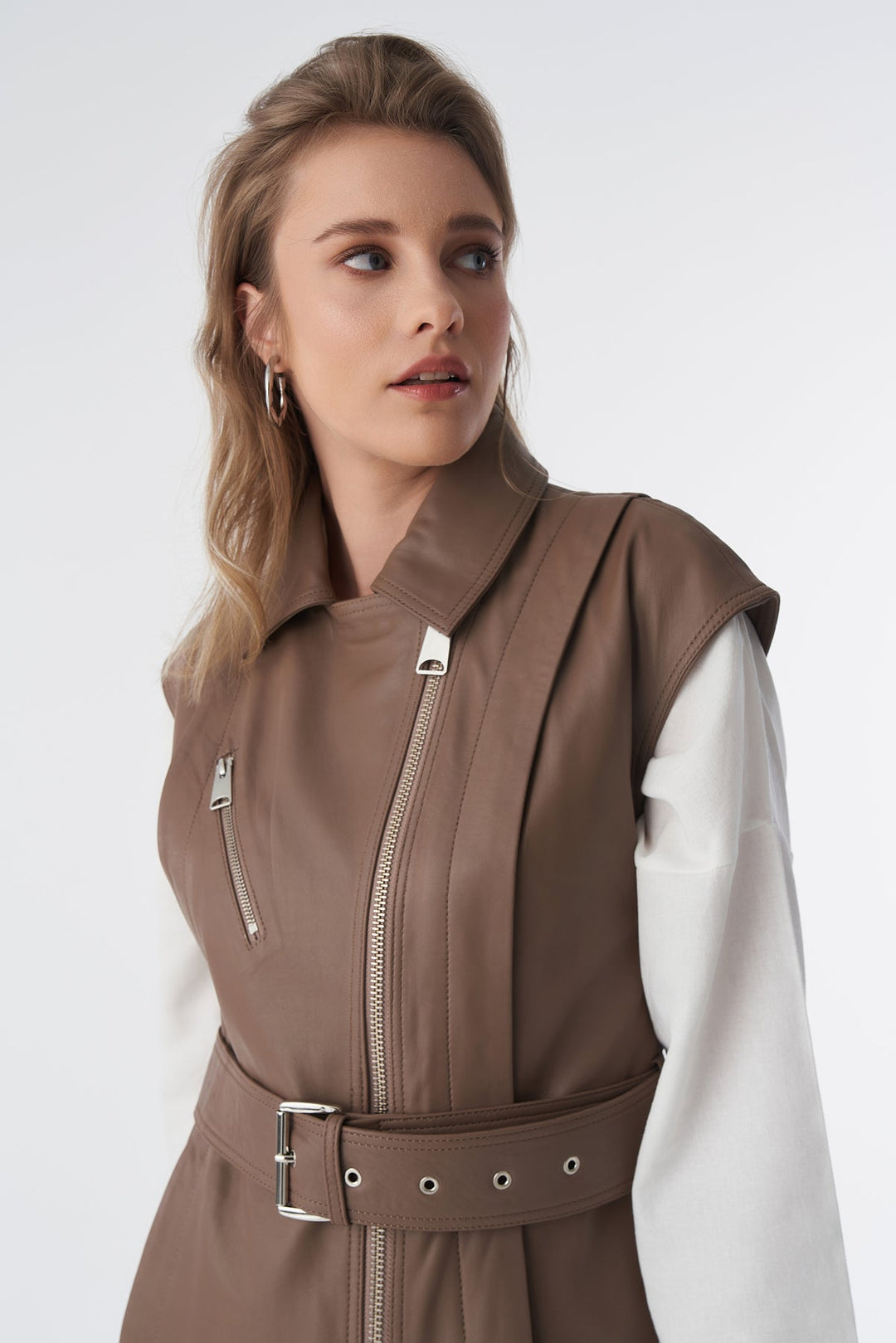 Brown leather belted vest on model