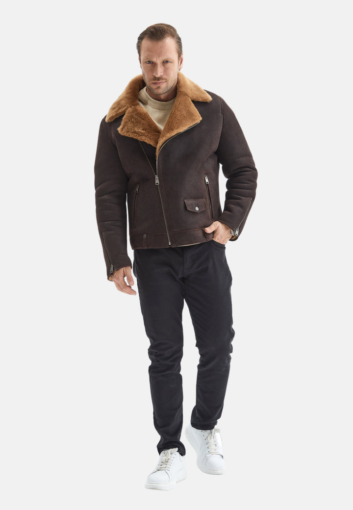 Man wearing brown shearling jacket