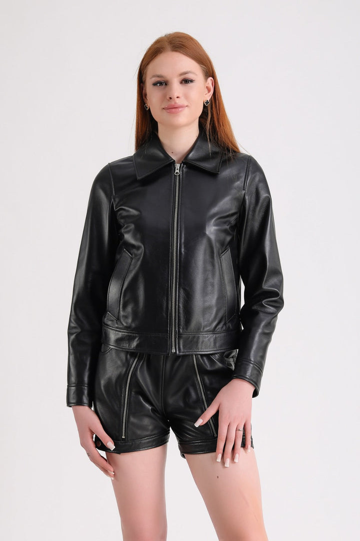 Female model in black leather jacket