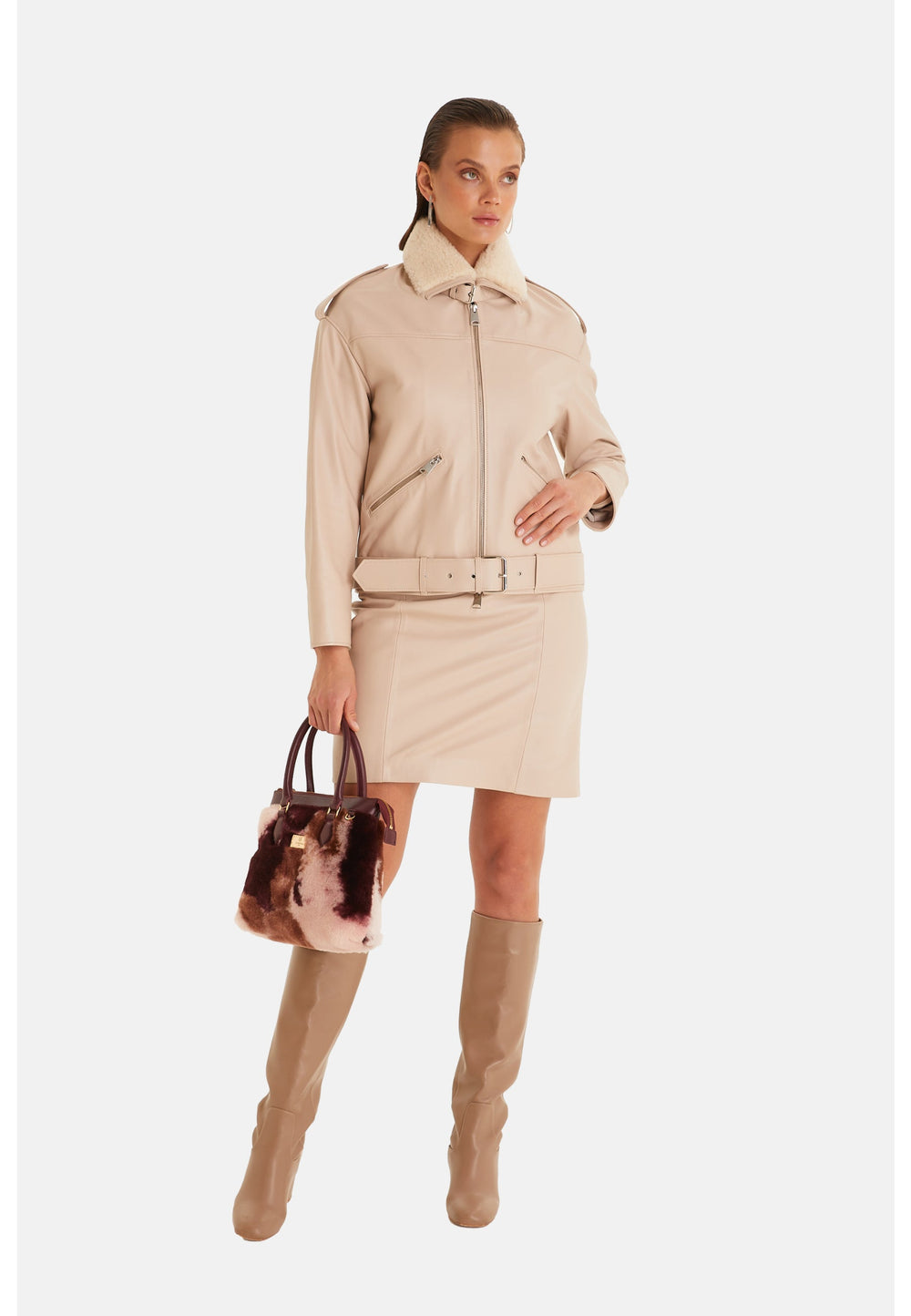 Woman in beige leather jacket