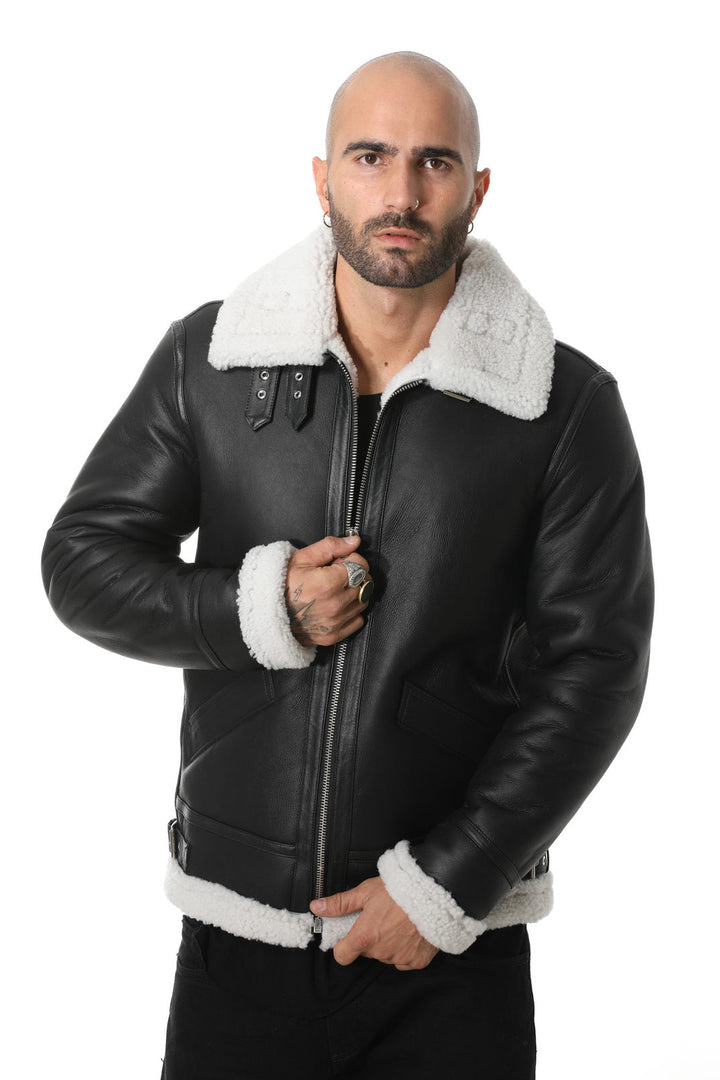 Man wearing black shearling aviator jacket
