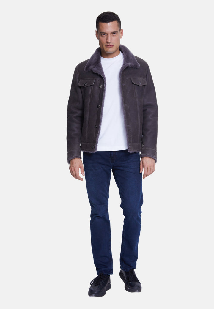 Male model wearing black suede jacket