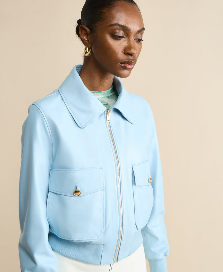 Light blue leather bomber jacket on model