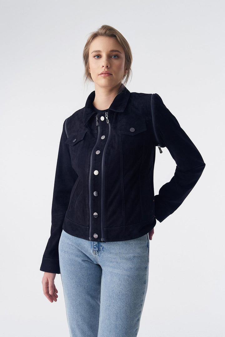 Woman wearing navy suede jacket