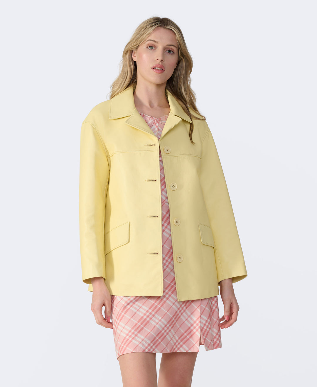 Yellow leather jacket on model