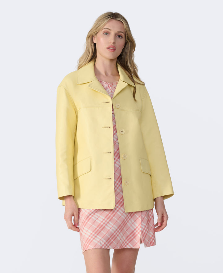 Yellow leather jacket on model