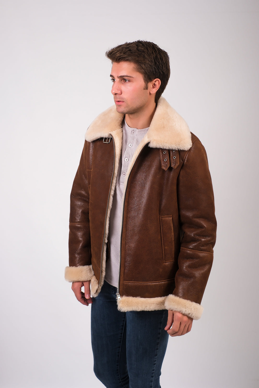 Man wearing brown shearling aviator jacket