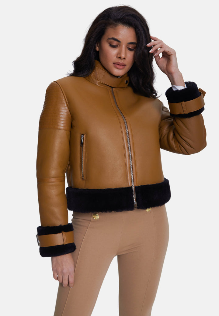Brown sheepskin cropped jacket with black trim