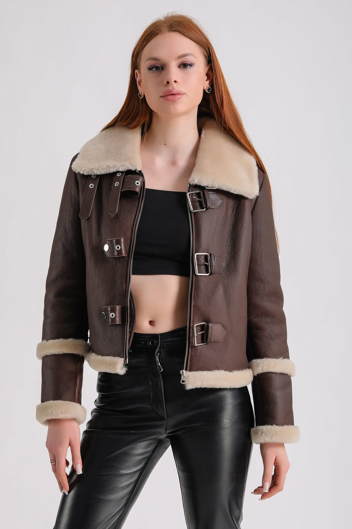 Brown shearling cropped jacket on model