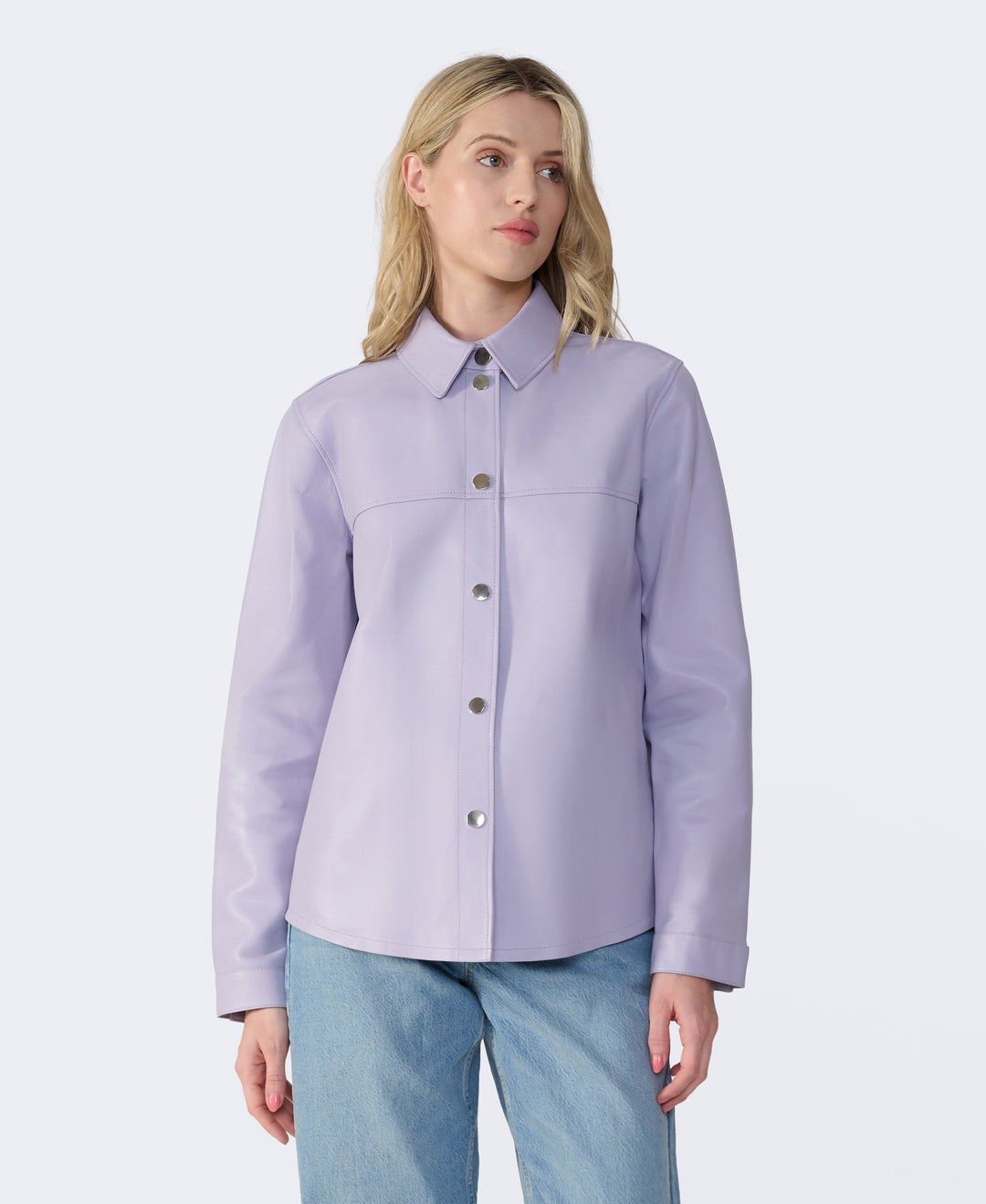 Woman wearing lilac leather shirt jacket