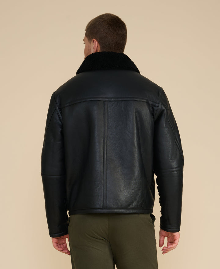 Black shearling leather jacket back view